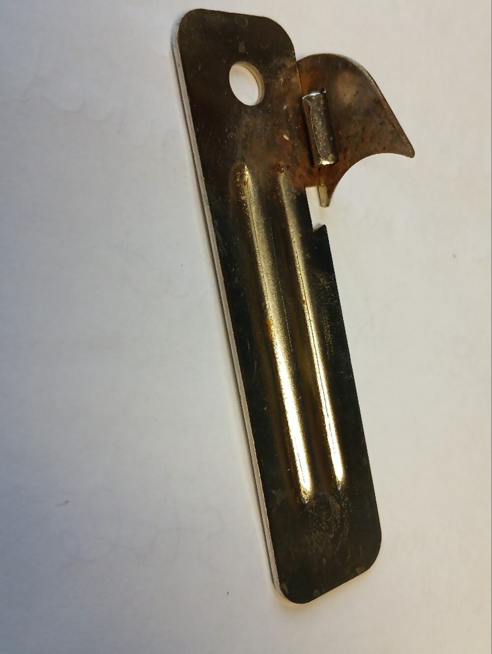 Military-style camping portable can opener.